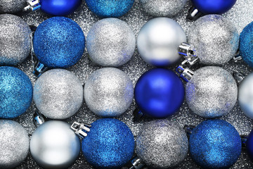 Blue and silver christmas baubles background