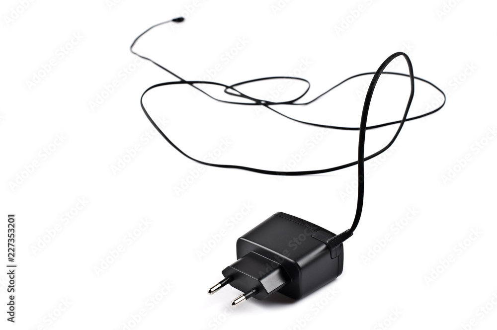 Wall mural mobile phone battery charger on white background.