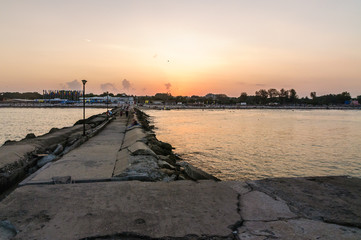 Obraz premium Sunset iver Black See shore in Jupiter town (Romania)