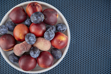 Fresh fruit on a white plate