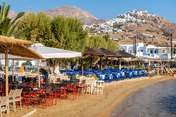 Obraz premium Typical Greek taverns on beach in Livadi town. Serifos island, Greece