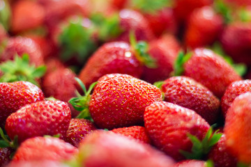 Ripe and sweet strawberries fruit close-up view