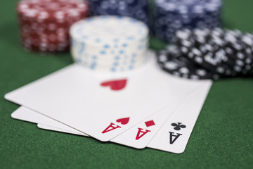 Casino abstract photo. Poker game on red background. Theme of gambling