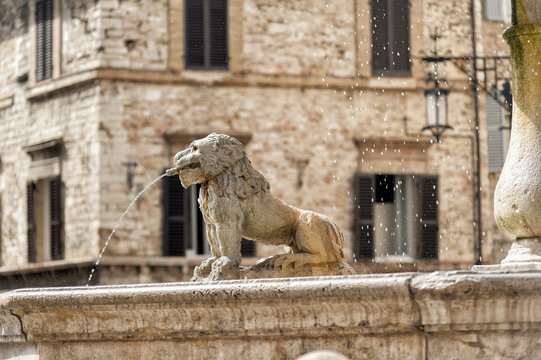 Fountain of the lions in the square of the municipality.Assisi
