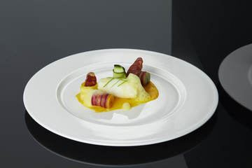 Poached Fish fillet with vegetables
