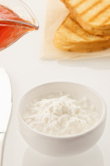 Healthy food. Morning breakfast. Healthy diet and breakfast. Cheese jam and bakery. Closeup white background Top view