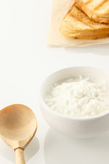 Toast, cottage cheese. Closeup white background Top view