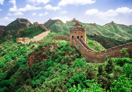 The Great Wall Jinshanling section with green trees in a sunny day, Beijing, China