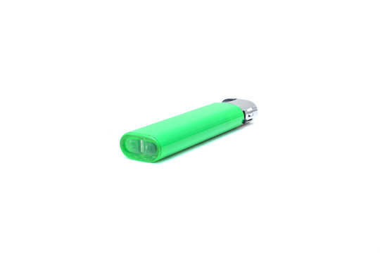 Green disposable lighter on white isolated background