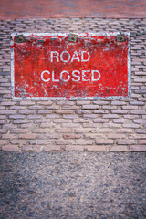 Road closed red sign on street