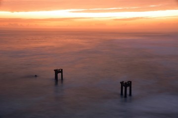 Fototapeta premium Abandoned pier at sunset