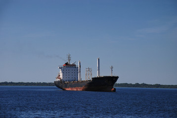 Fototapeta premium An oil tanker on the Rio Negro near the Port of Manaus in Brazil.
