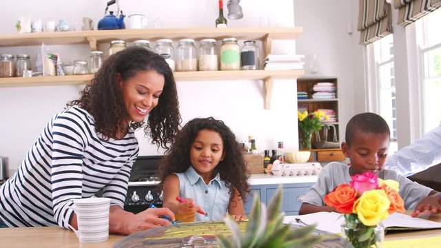 Young Black Family Talking At Their Kitchen Island, Close Up