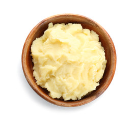 Bowl with mashed potatoes on white background, top view