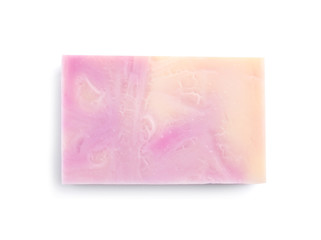 Hand made soap bar on white background, top view