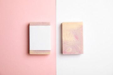 Hand made soap bars on color background, top view. Mockup for design