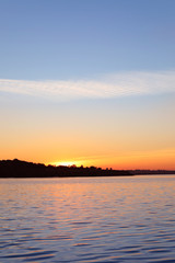 Picturesque view of beautiful sunset on riverside