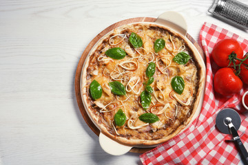 Flat lay composition with delicious homemade pizza and space for text on wooden background