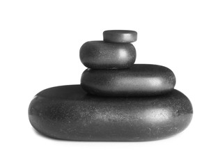 Stack of zen spa stones on white background