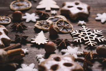 Christmas, New Year, DIY, holidays preparation and creativity concept. Festive decorations, spices, gingerbread cookies close up