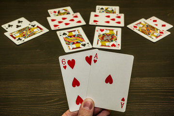 A game of cards. Four cards had already beaten. And two trumps in the hand - the six of hearts and the ace of hearts – that a way for easy win at this round