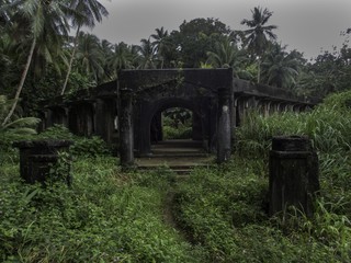 Ruins of the old civilian hospital built by the Japanese on Tonoas Island, Chuuk State (also known as Truk Lagoon).