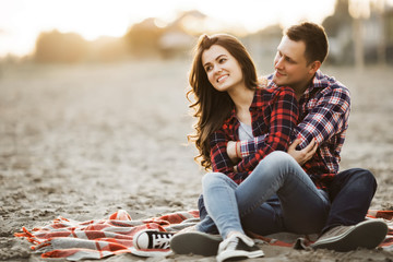 Loving couple embracing on the beach