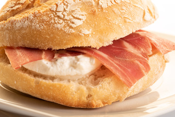 cured ham with fresh cheese sandwich