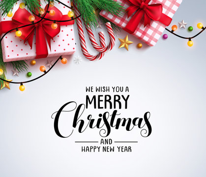 Christmas greeting vector background with text and colorful christmas elements like gifts, candy cane and lights in white background. Vector illustration.
