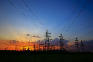 Fototapeta premium Electric tower, silhouette at sunset