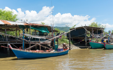 Fototapeta na wymiar Fishing Village and Fishing Boat Side Khao Dang Canal 2