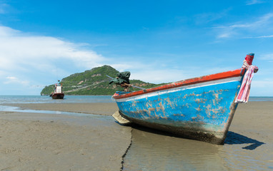 Fototapeta na wymiar Blue Fishing Boat on Sam Roi Yod Beach Prachuap Khiri Khan Thailand Right 2