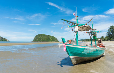 Fototapeta na wymiar Green Fishing Boat at Sam Roi Yod Beach Prachuap Khiri Khan Thailand Right 2