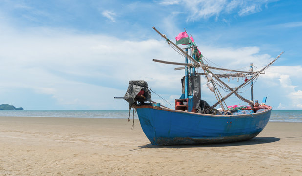 Blue Fishing Boat on Sam Roi Yod Beach Prachuap Khiri Khan Thailand Right