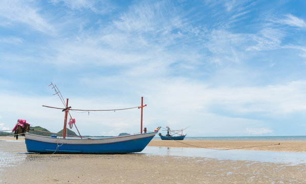 Blue Fishing Boat on Sam Roi Yod Beach Prachuap Khiri Khan Thailand