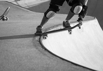 Skater getting ready to go down in the bowl
