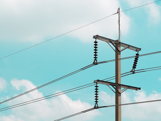 electric pole with blue sky background.