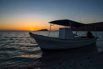 Fishing boat at sunset