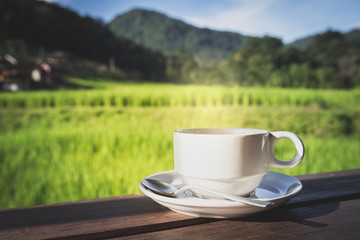 cup of hot tea in nature