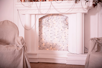 fireplace, armchair and new year decor