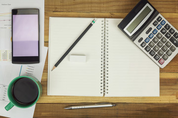 Fototapeta premium Business concept of office working, Blank notebook with business background, Vintage effect