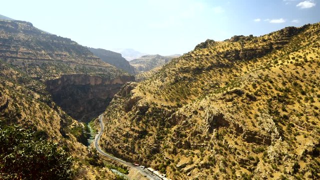 impressive Soran Valley of Kurdistan, Iraq with a lot of bushes and trees and special yellow colored stone