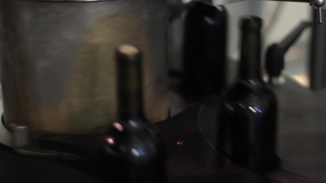 Corking wine  bottles