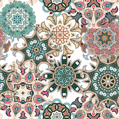 Seamless multicolor pattern with oriental mandalas. Islam, Arabic, Asian motifs. Kaleidoscope elements. Vintage lace mood. Fabric, wallpaper or wrap print