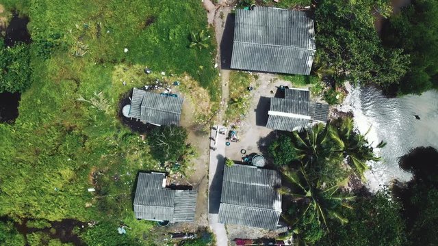 A small village on Thailand. Top view. The camera slowly rises higher