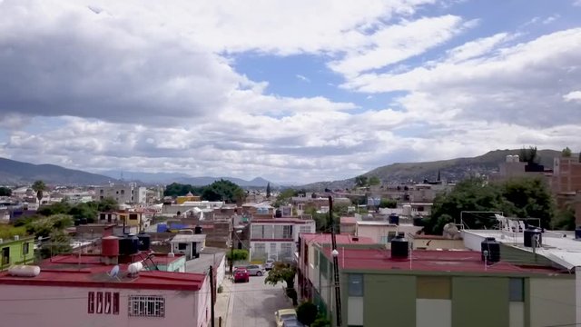 Aerial shot over Oaxaca City in Oaxaca, Mexico on a sunny day.