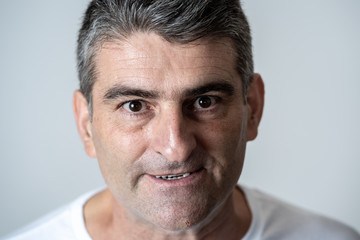 Obraz premium Mad and aggressive guy in facial expressions and human emotions