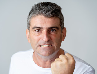 Fototapeta premium Mad and aggressive guy in facial expressions and human emotions