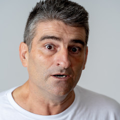 Obraz premium Concern scared shocked adult man with a terrified facial expression
