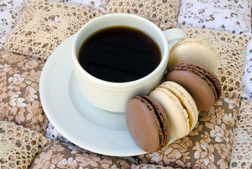 cup of coffee and macaroon